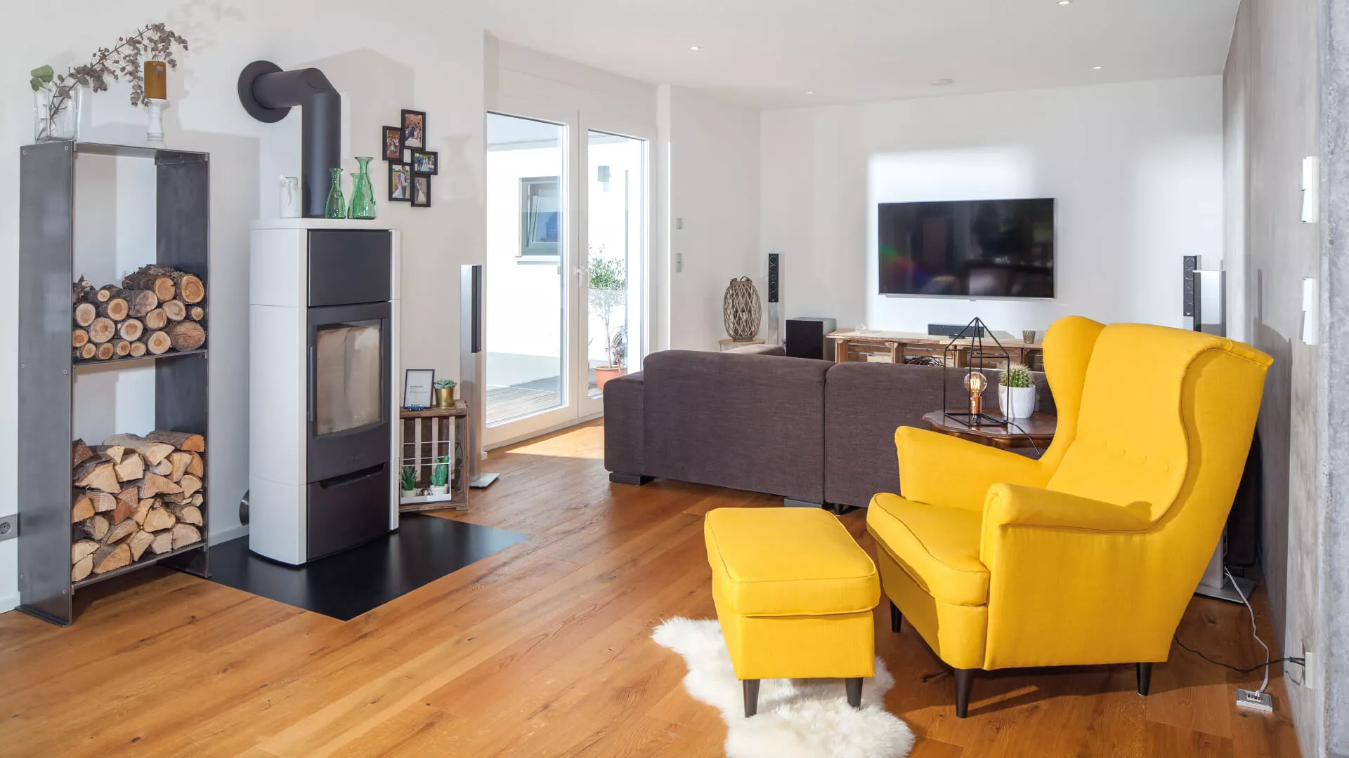 Wohnzimmer mit Kaminofen im Haus Zimdal