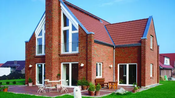 Haus Jansen | Ein Schornstein als besonderer Blickfang.