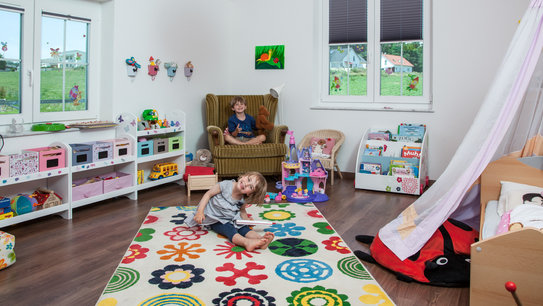 Das bunte Kinderzimmer im Haus Zieglmeier läd zum spielen ein. (Foto: BAUMEISTER-HAUS) 