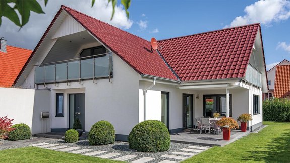 Haus Tillmann | Klassisches Einfamilienhaus mit zwei stilvollen Loggien.
